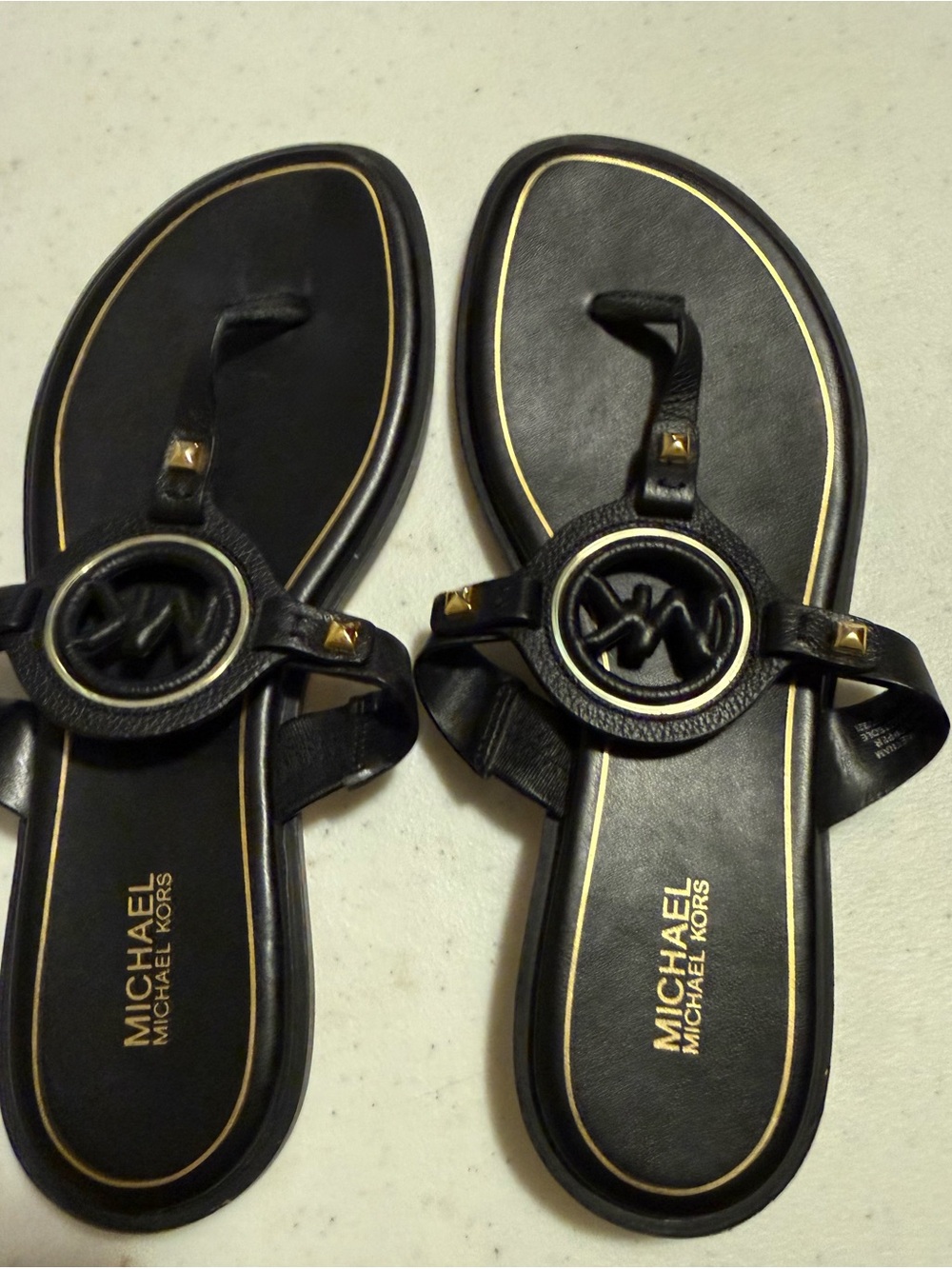MICHAEL Michael Kors Black Sandal with Gold Accents MK Logo